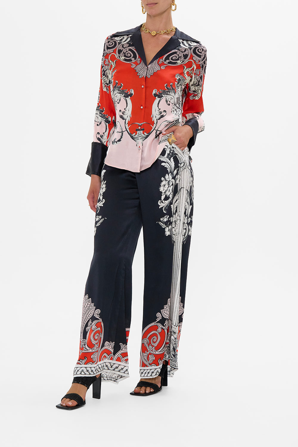 The CAMILLA METAL EYELET KAFTAN ROCOCO GLOW in our  print.
