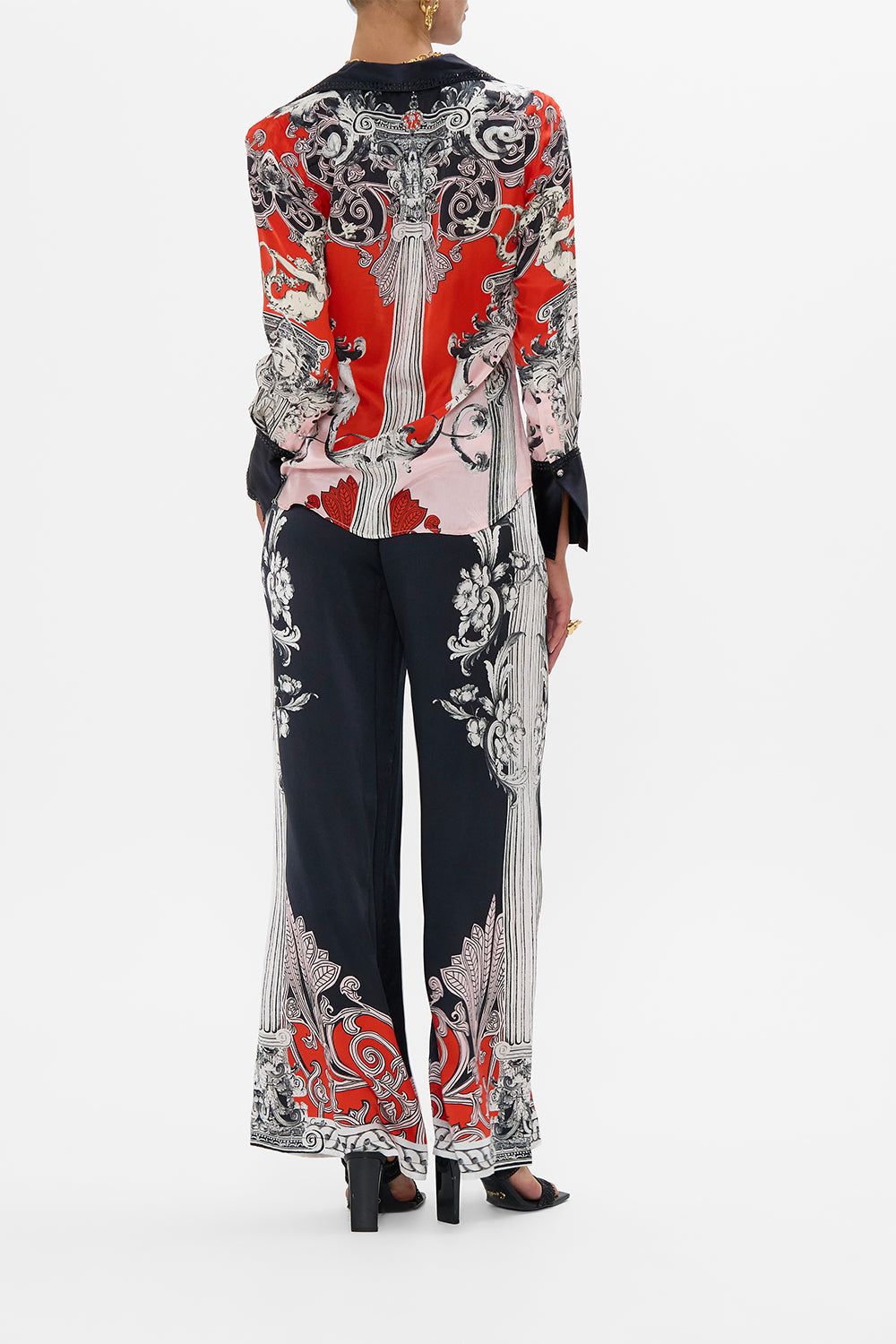 The CAMILLA METAL EYELET KAFTAN ROCOCO GLOW in our  print.