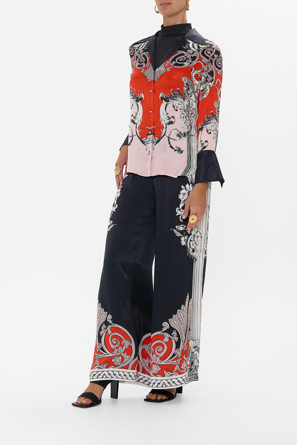 The CAMILLA JERSEY SPLICED TIERED SKIRT FOLK FABULOUS in our  print.