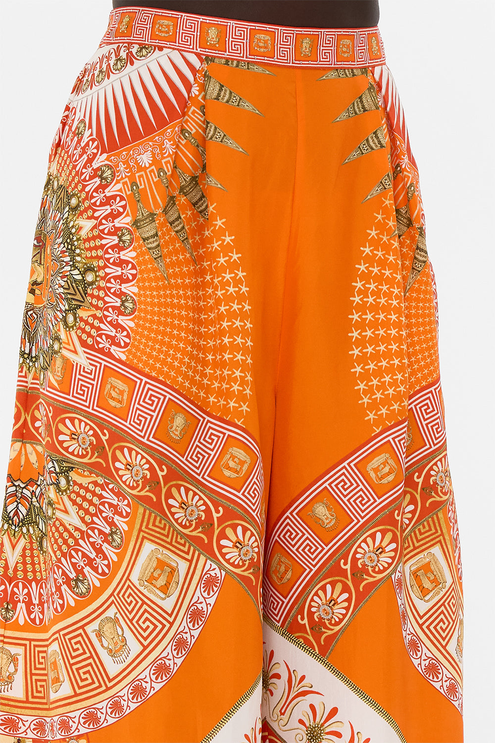 The CAMILLA DROP SHOULDER TOP LAND OF WONDER in our LAND OF WONDER print.