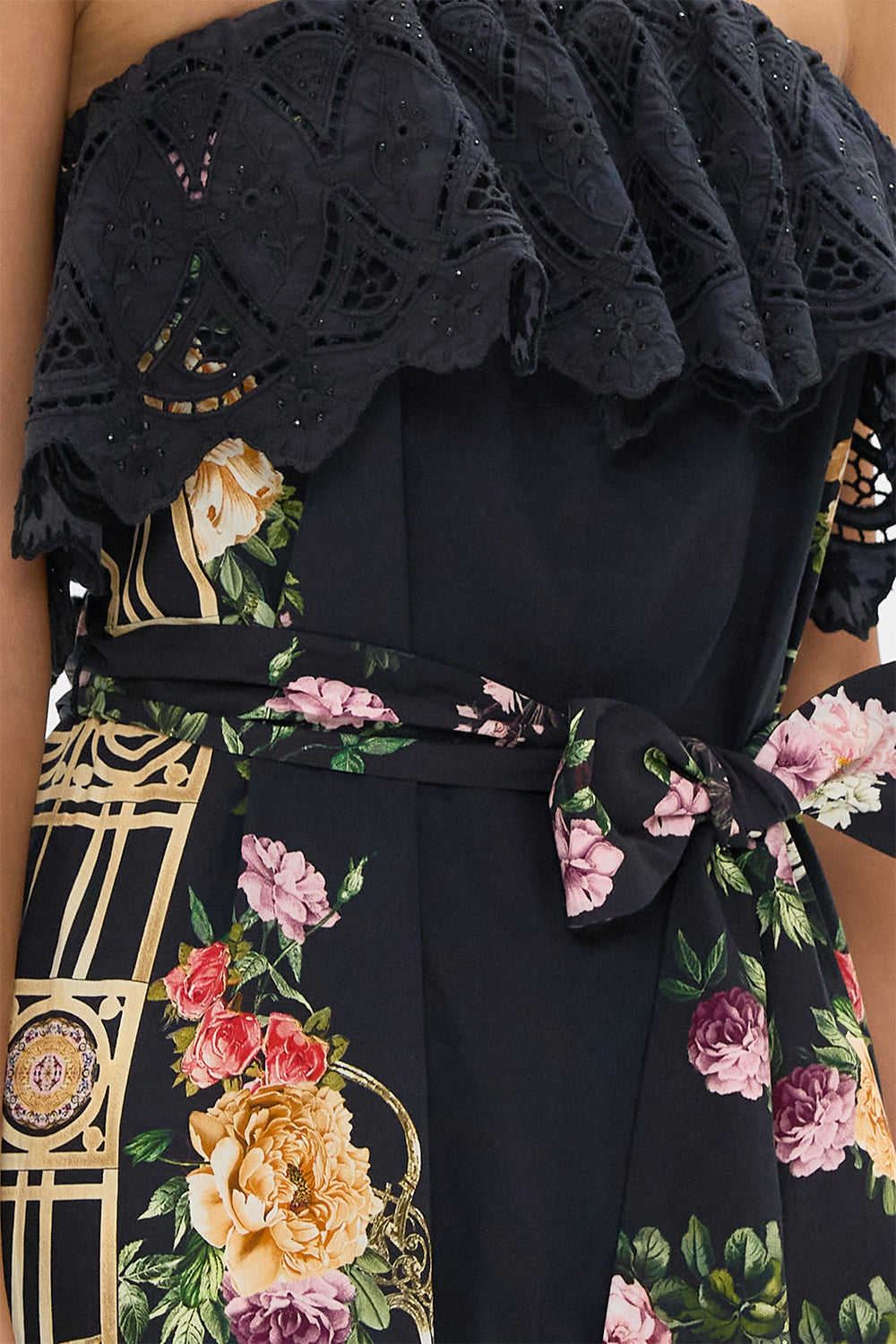 STRAPLESS JUMPSUIT WITH FRILL ADORNED IN ALEXANDRIA