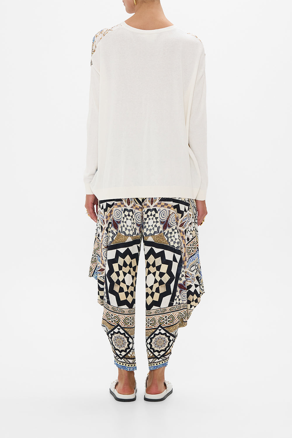 The CAMILLA OVERSIZED CROPPED TEE WITH SILK DETAILS DEFY GRAVITY in our  print.