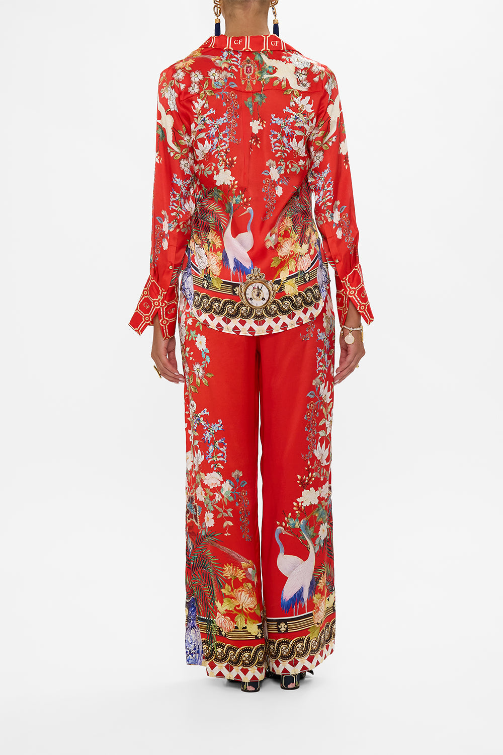 The CAMILLA WIDE LEG TROUSER WITH FRONT POCKETS ROCOCO GLOW in our  print.