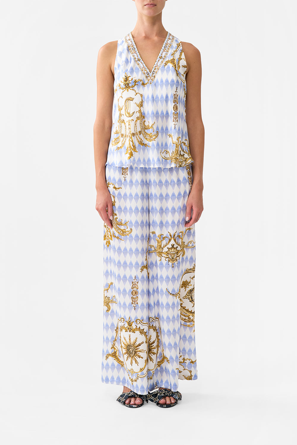 The CAMILLA ARTISAN ARTILLERY STATEMENT NECKLACE GOLD in our  print.