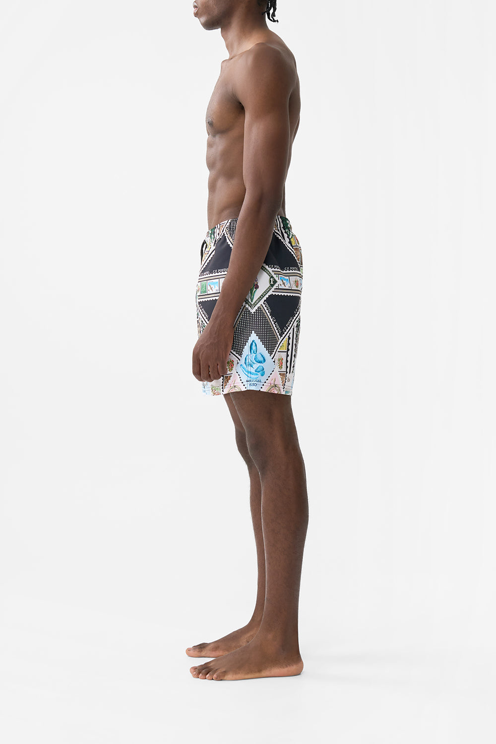 The CAMILLA MID LENGTH BOARDSHORT CORRIDOR OF CALM in our  print.