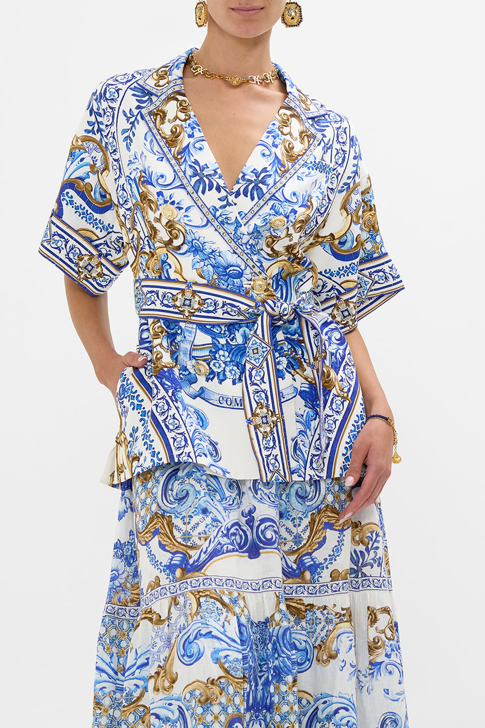 The CAMILLA ROSA BOW SLIDE PALACIO POETRY in our  print.