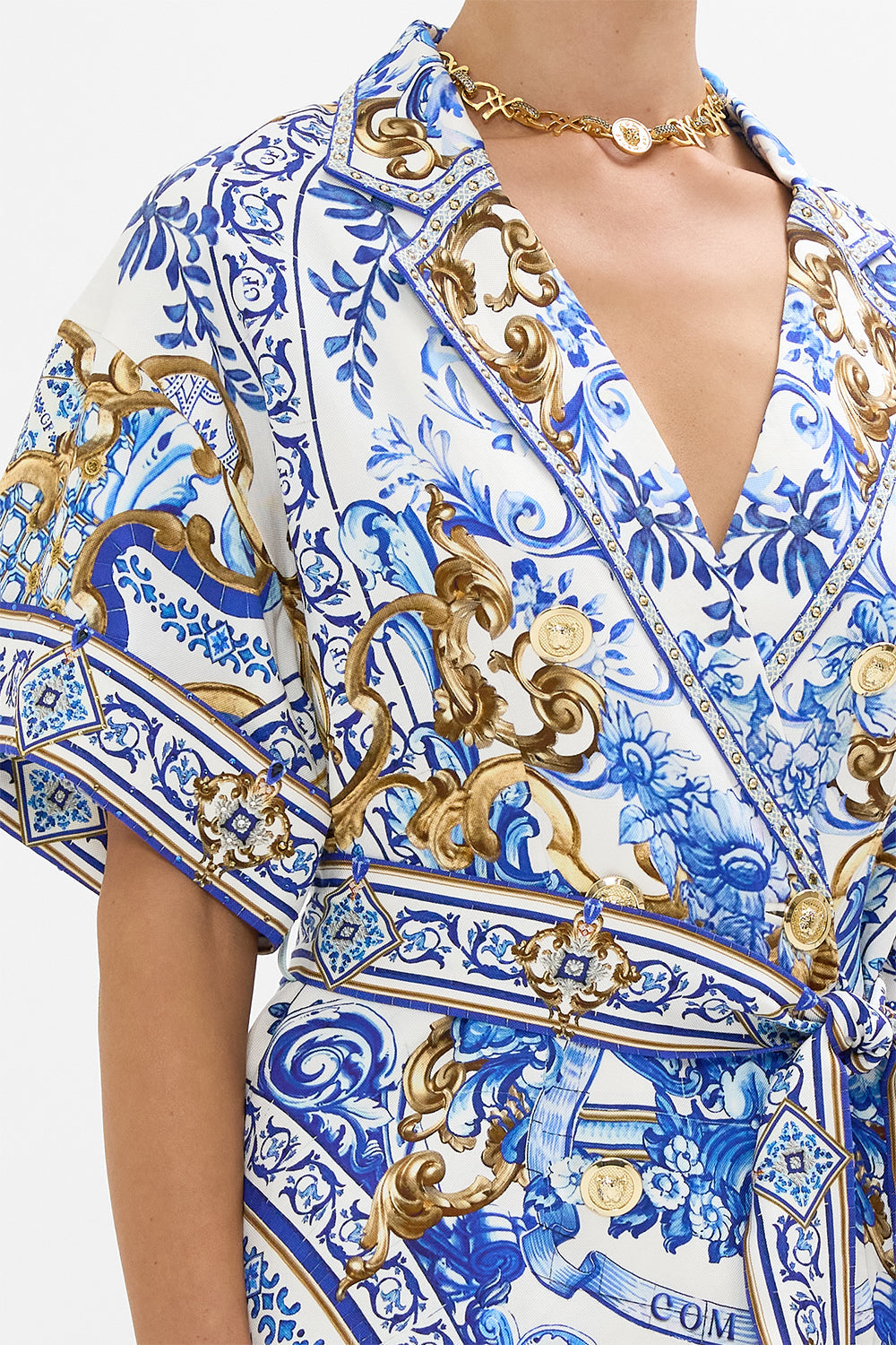 The CAMILLA ROSA BOW SLIDE PALACIO POETRY in our  print.