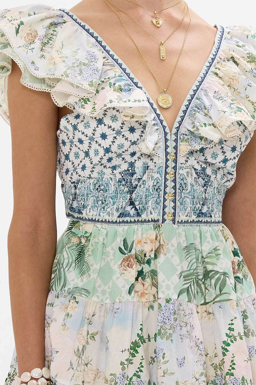 The CAMILLA STRAIGHT LEG PANT WELCOME TO THE WHITE LOTUS in our  print.