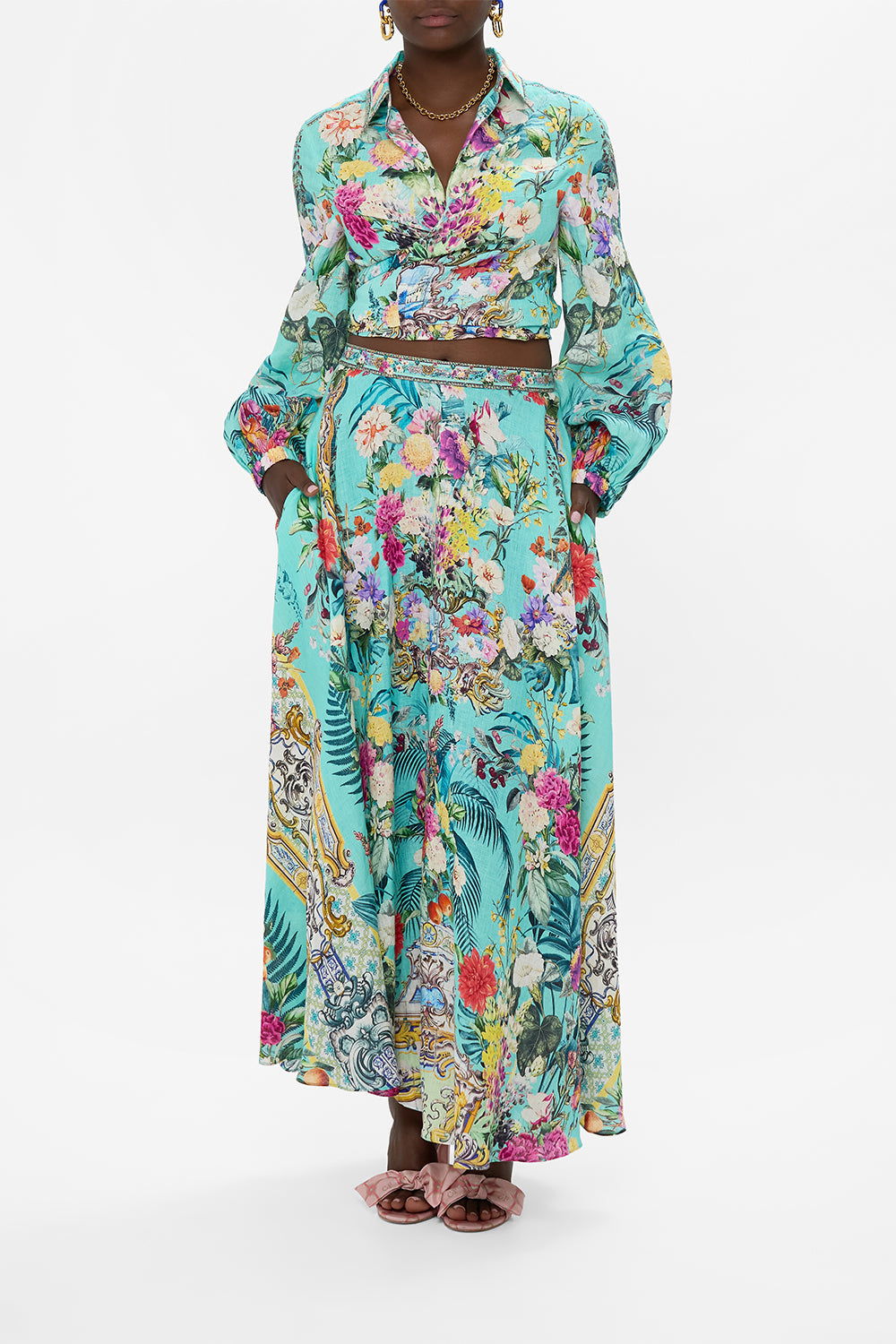 The CAMILLA KNOT FRONT PANELLED ONE PIECE FAITH, LUCK & JUSTICE in our  print.