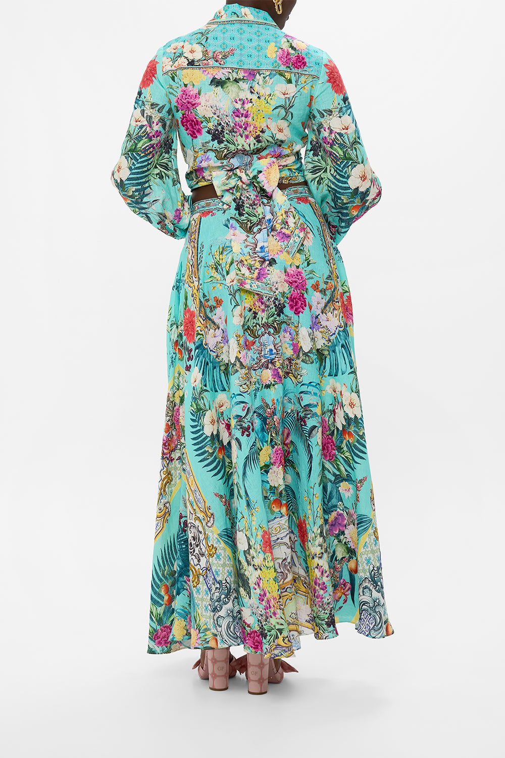The CAMILLA KNOT FRONT PANELLED ONE PIECE FAITH, LUCK & JUSTICE in our  print.