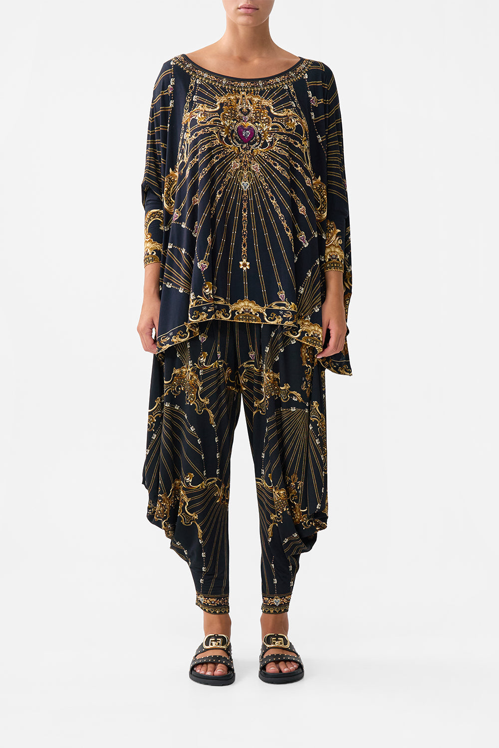 The CAMILLA TIE FRONT HALTER NECK ONE PIECE GARDENS OF QUELUZ in our  print.