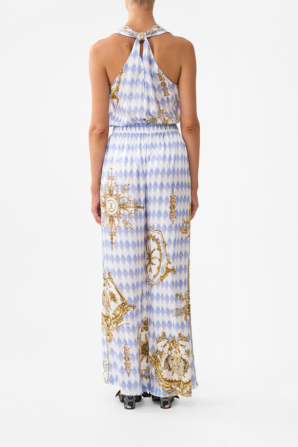 The CAMILLA STEPPED HEM SHIRT SONG OF SAINT ANTHONY in our  print.
