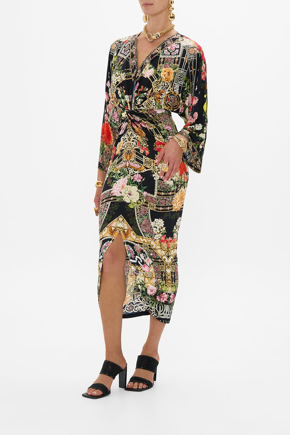 The CAMILLA OVERSIZED BAND TEE MUNCHKINLAND in our  print.