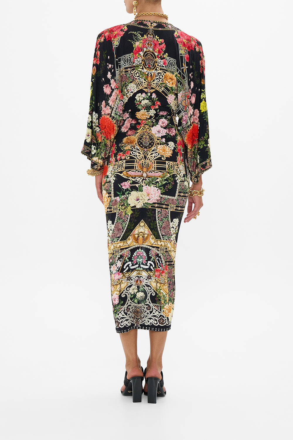 The CAMILLA OVERSIZED BAND TEE MUNCHKINLAND in our  print.