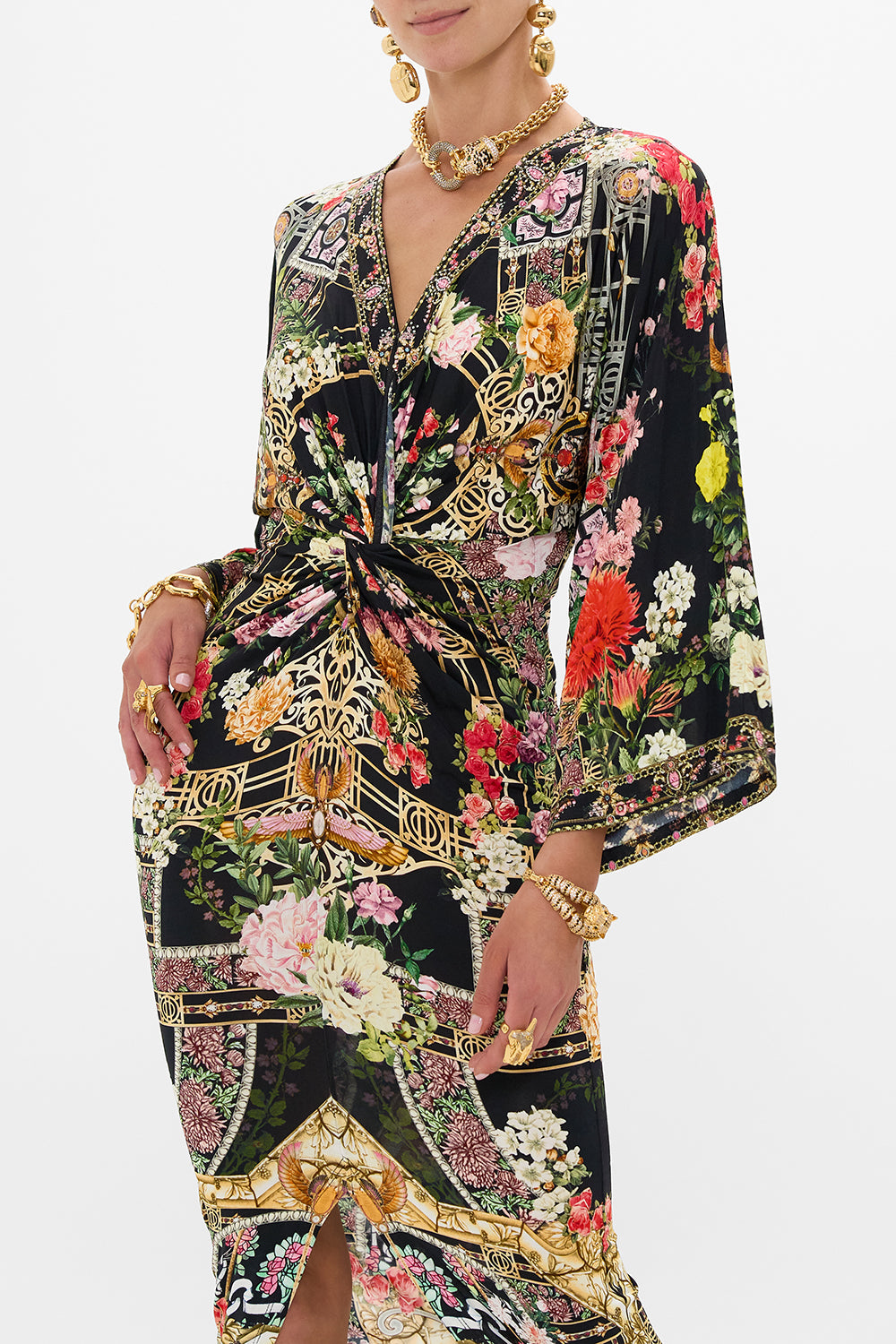The CAMILLA OVERSIZED BAND TEE MUNCHKINLAND in our  print.