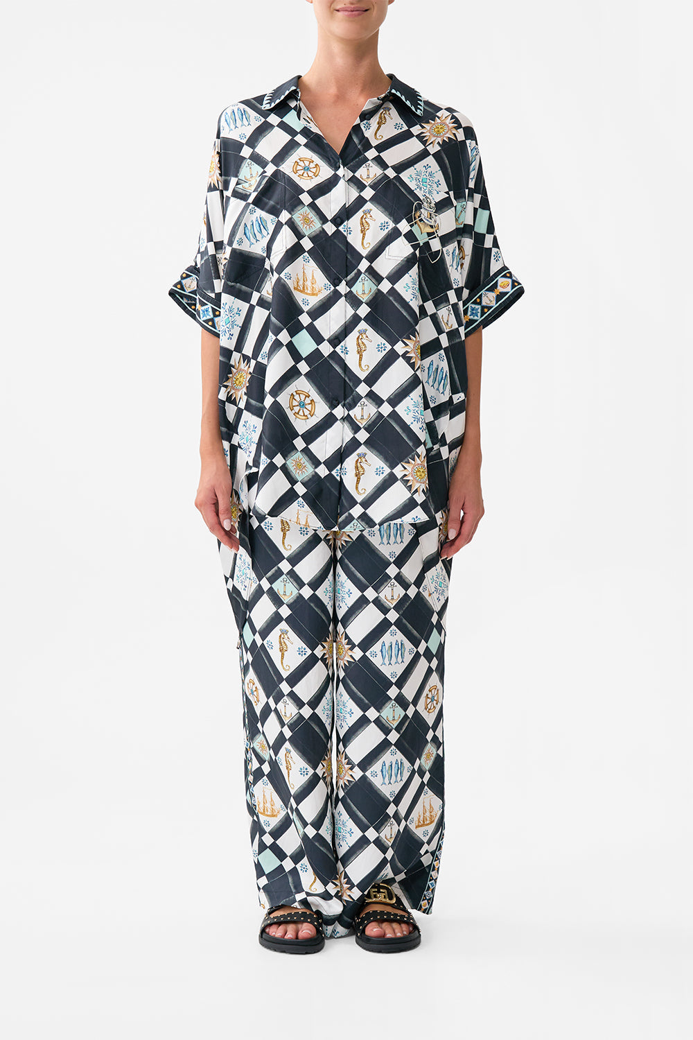 The CAMILLA SILK CHIFFON SHRUG TILES DARLS in our  print.