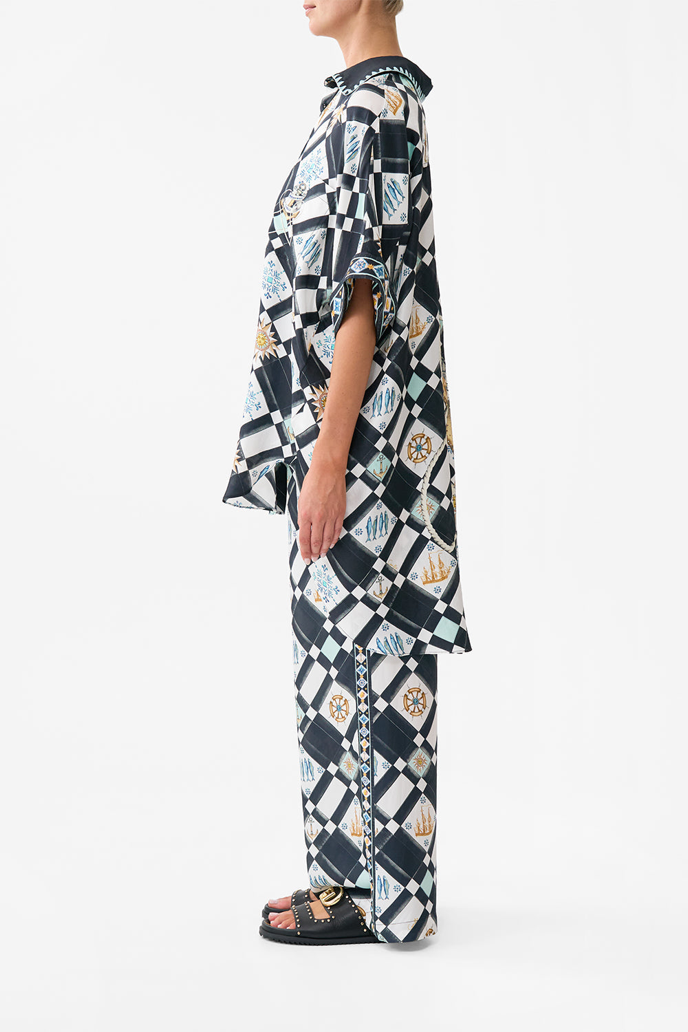 The CAMILLA BABIES SQUARE BLANKET SPIRIT OF SANTA MARIA in our SPIRIT OF SANTA MARIA print.