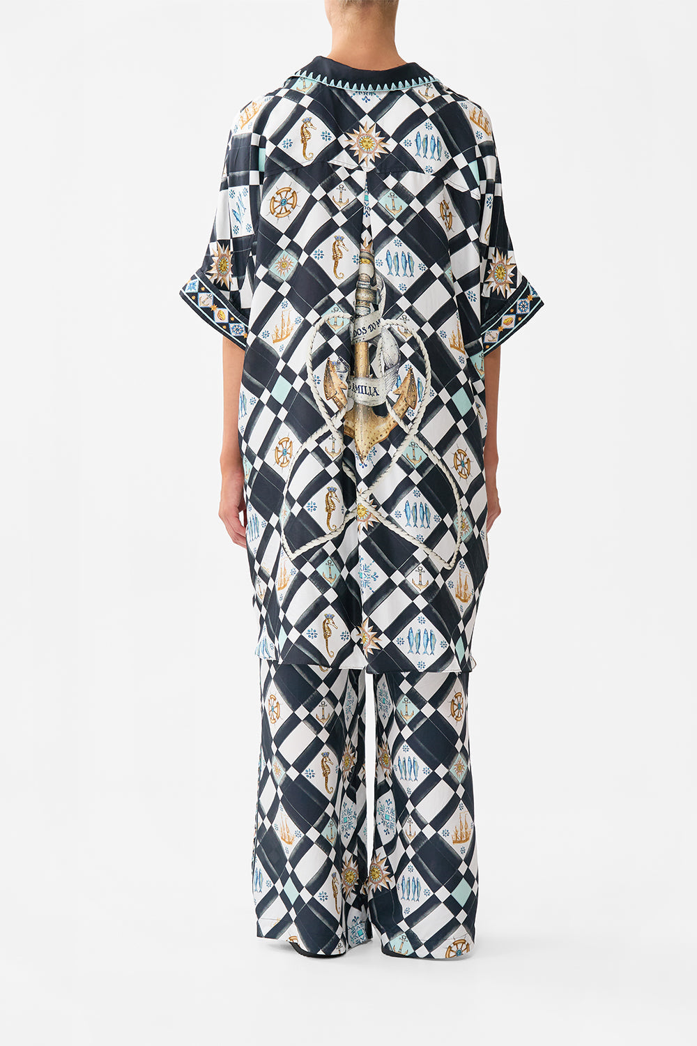 The CAMILLA SILK CHIFFON SHRUG TILES DARLS in our  print.