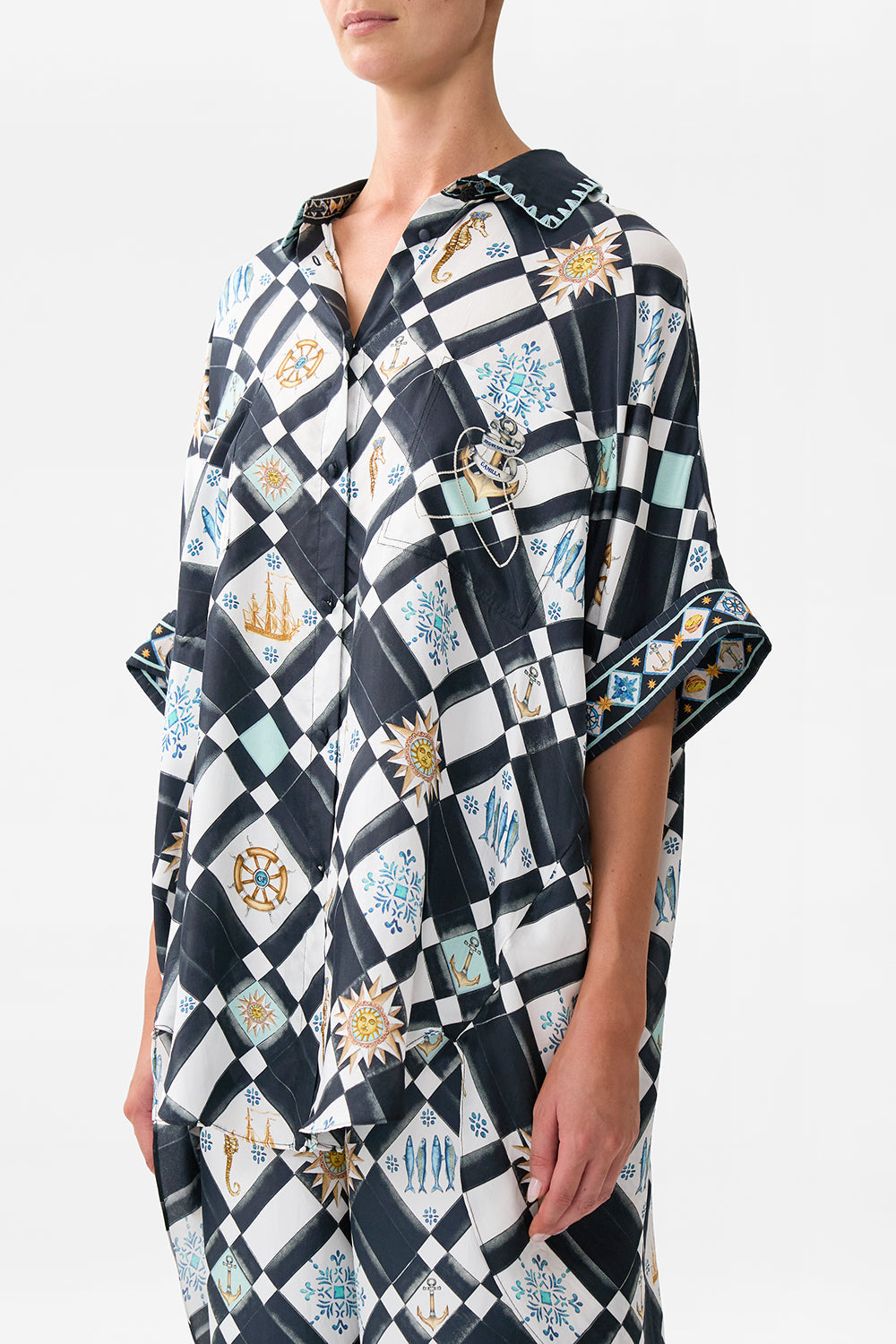 The CAMILLA BABIES SQUARE BLANKET SPIRIT OF SANTA MARIA in our  print.