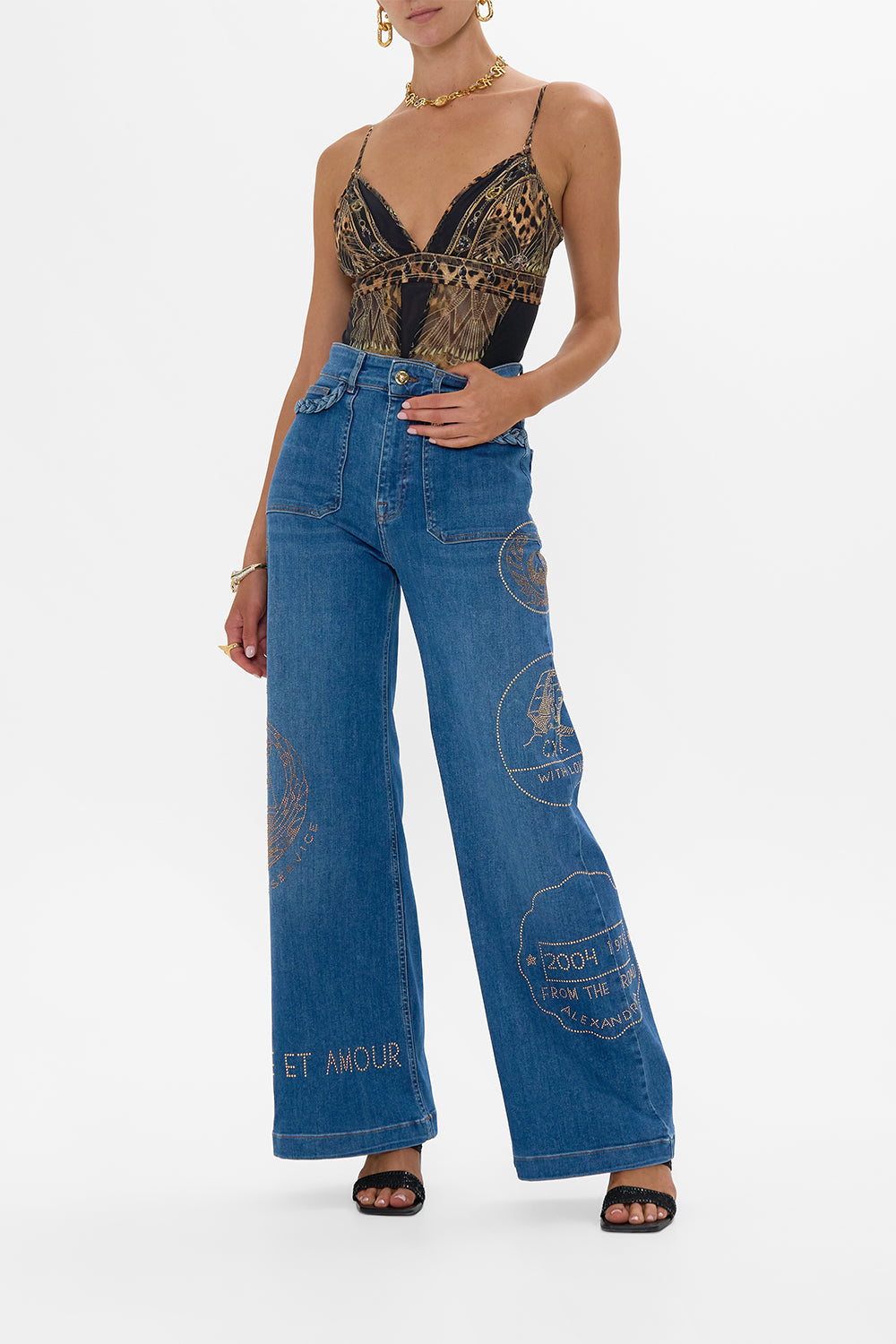 The CAMILLA CROPPED JACKET WITH CUTOUT AND BUCKLE DETAIL THEY CALLED HER NEFERTARI in our  print.