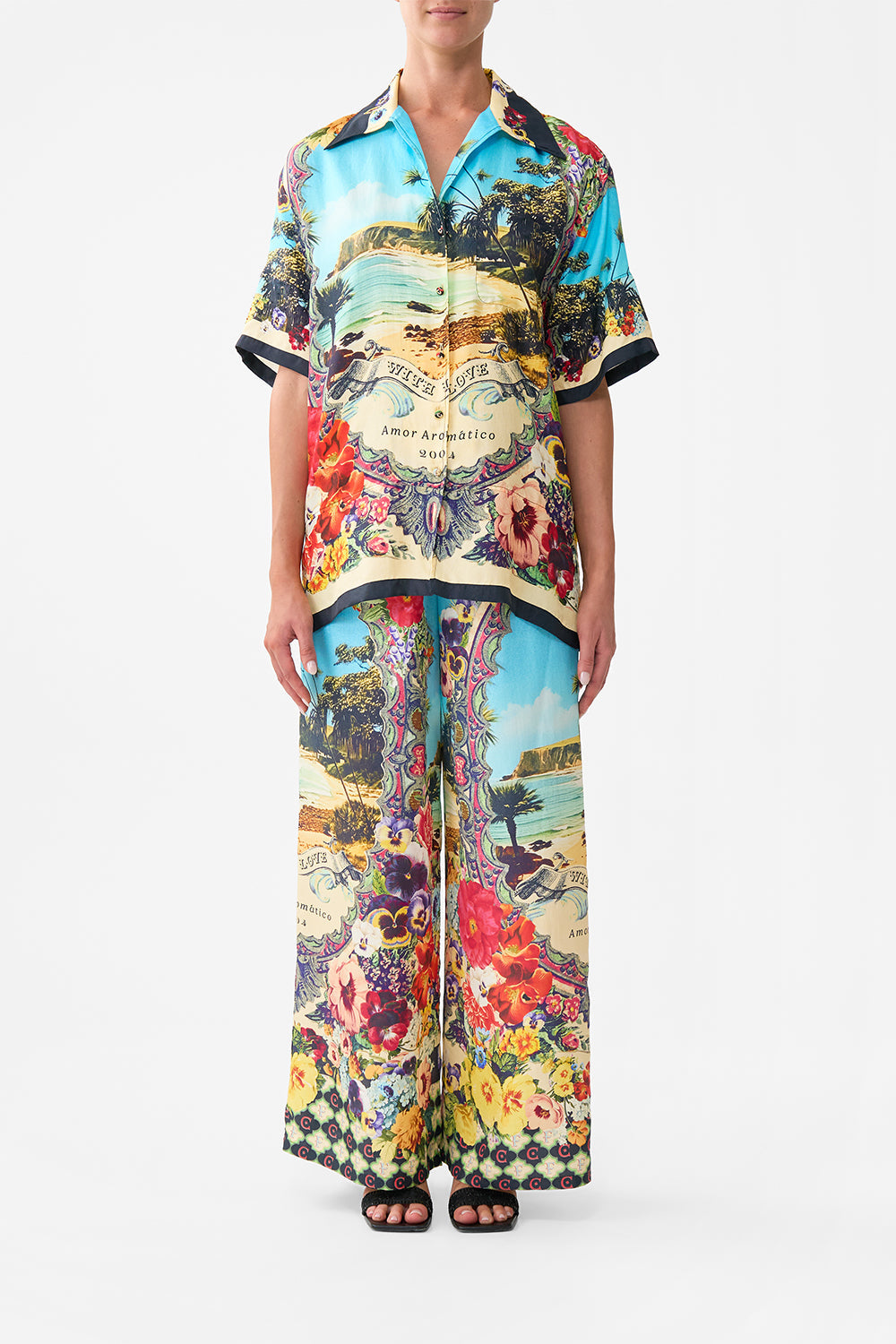 The CAMILLA RUFFLE HEM HALTER SHORT DRESS BATHING BOMBSHELL in our  print.