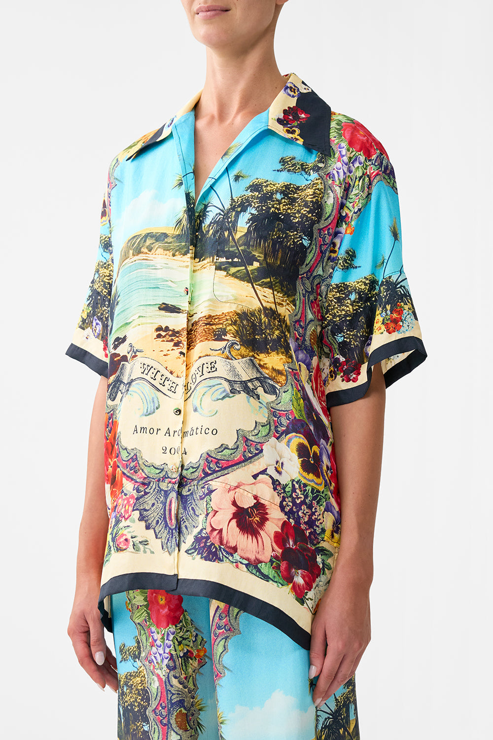 The CAMILLA SILK CHIFFON SHRUG TILES DARLS in our  print.