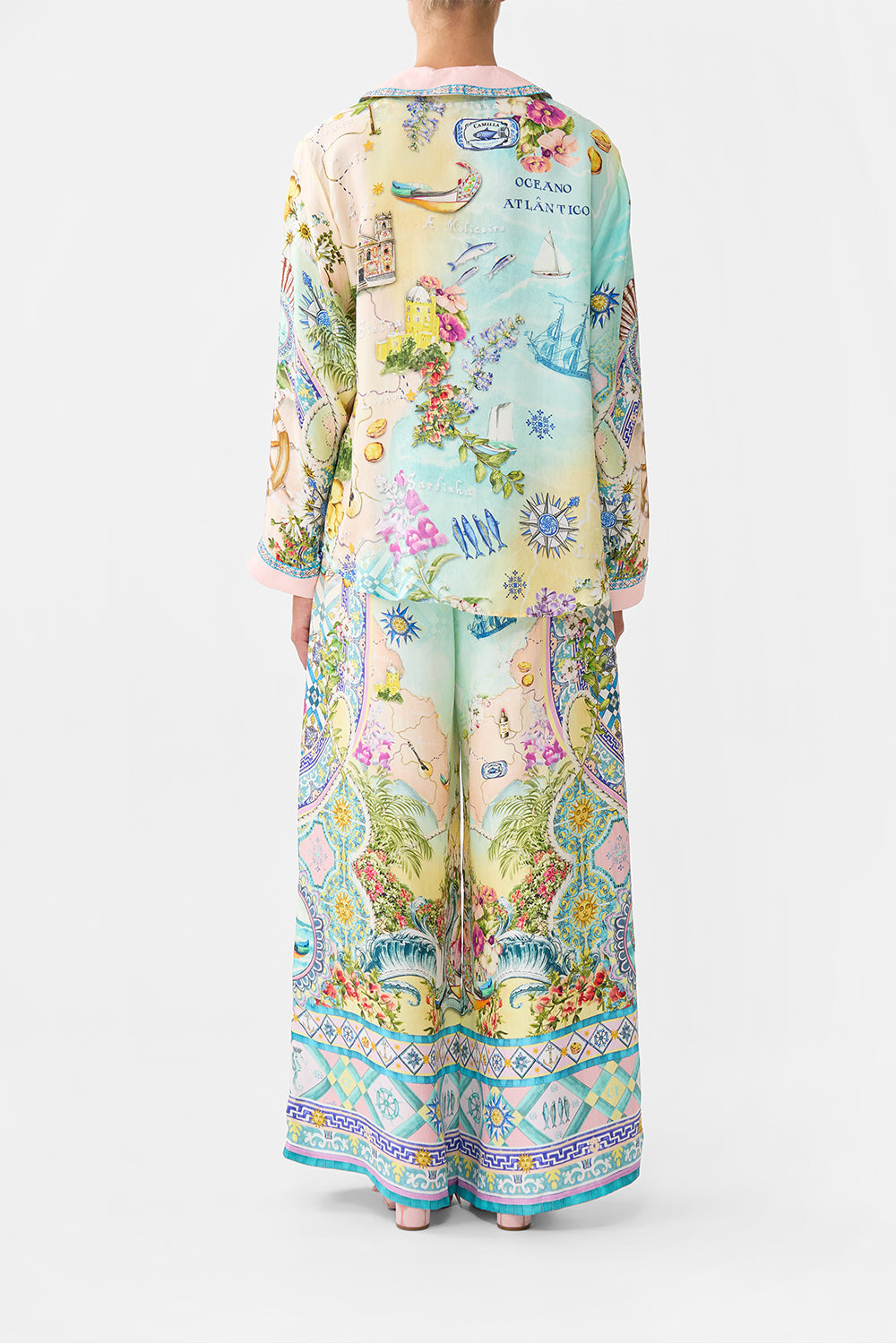 The CAMILLA HIGH WAISTED TIERED SKIRT AROMATIC AMOR in our  print.