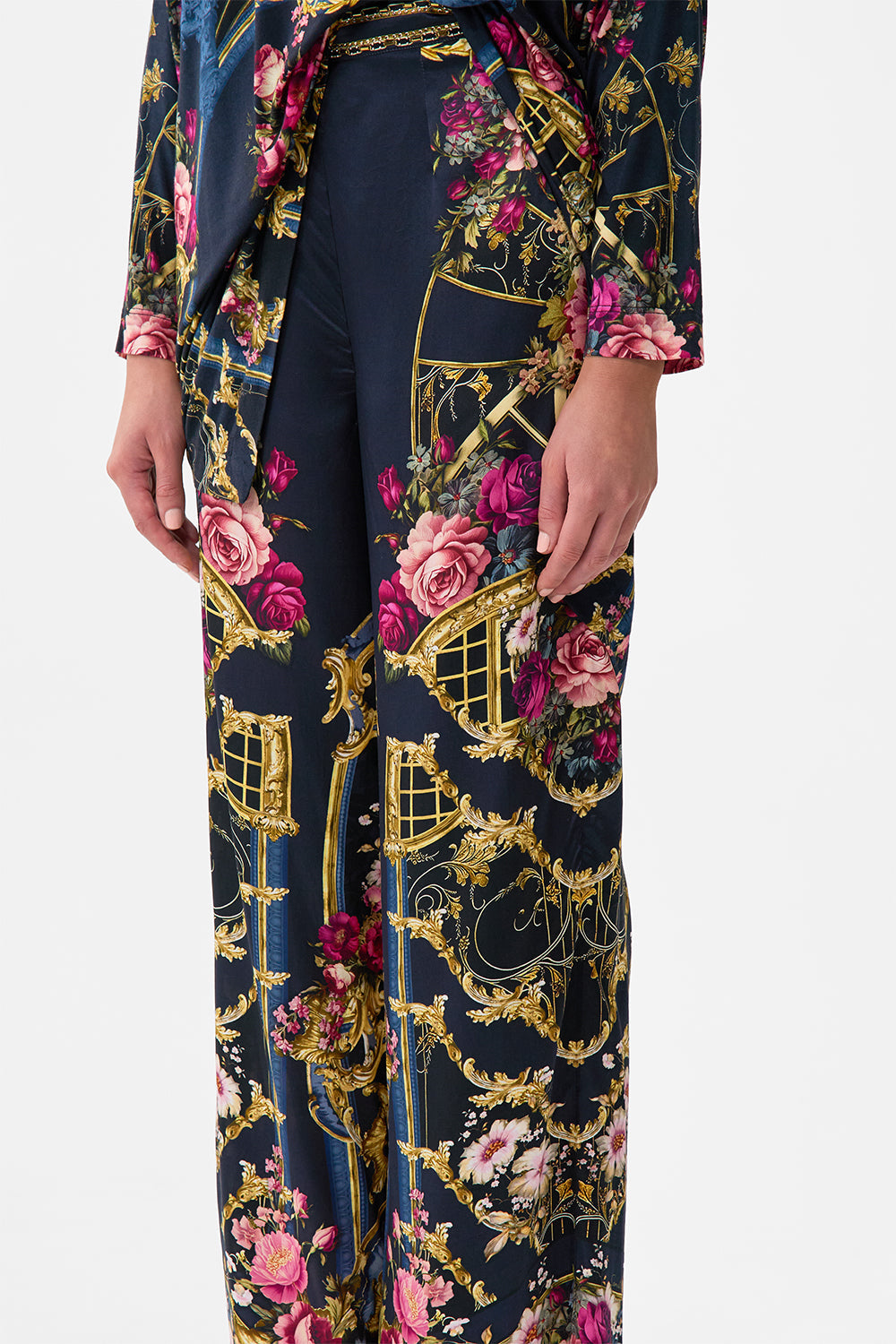The CAMILLA TURTLENECK MESH DRESS FLOWER SHOWERS in our  print.