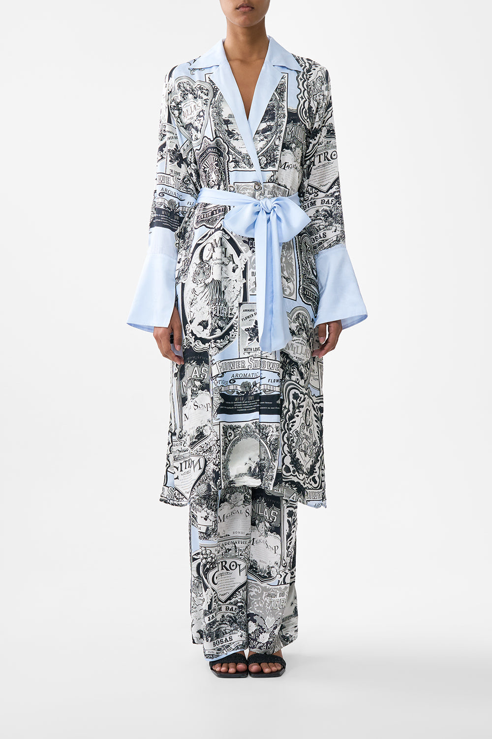 The CAMILLA BUTTON FRONT STRAPPY DRESS MEET ME AT THE MAJESTIC in our  print.