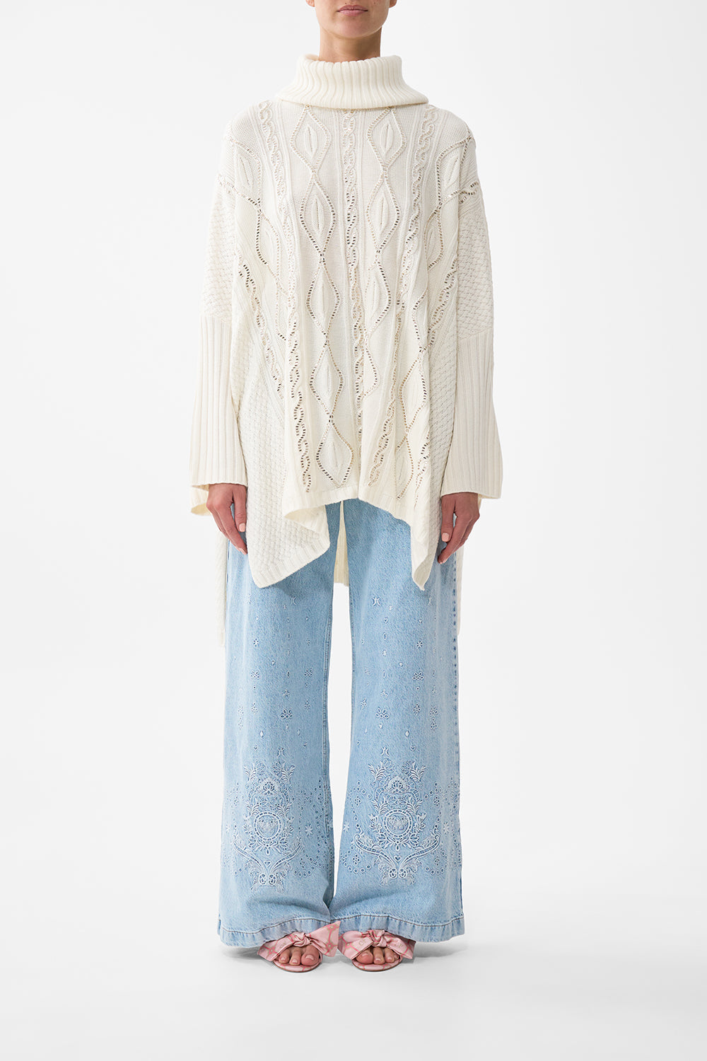 The CAMILLA Roll Neck Knit Jumper in our Solid Ivory print.