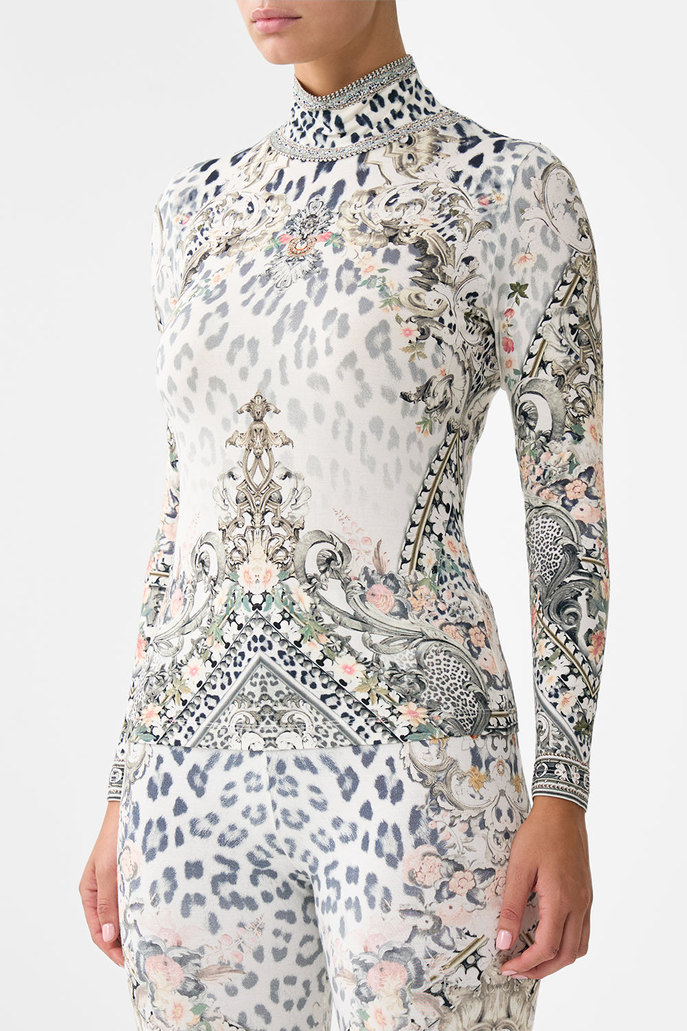 The CAMILLA BUTTON FRONT HALTER PLAYSUIT NOTES FROM THE ROAD in our  print.
