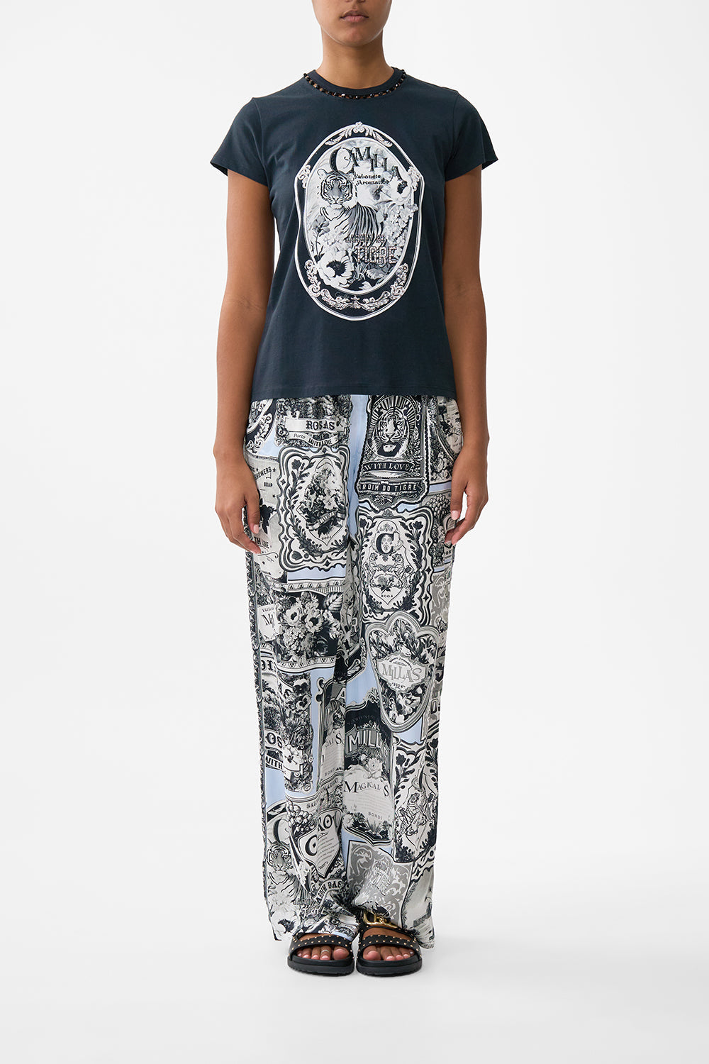 The CAMILLA Slim Fit Round Neck T-Shirt - Black in our Perfumed In Porto print.