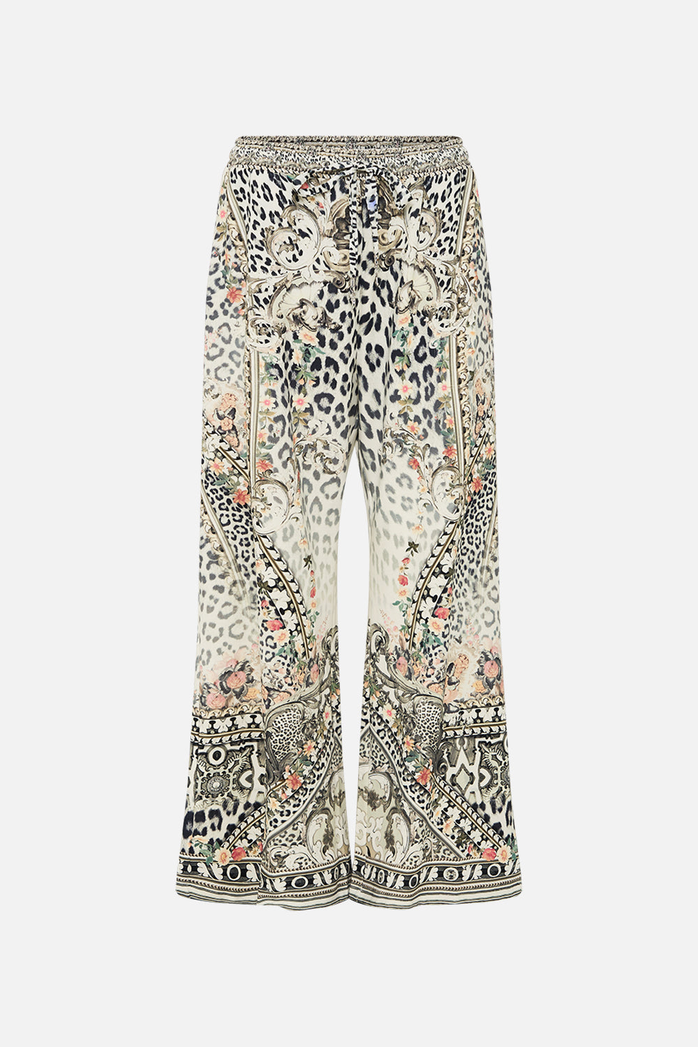 The CAMILLA MID LENGTH BOARDSHORT WITH ELASTIC WAIST NOTES FROM THE ROAD in our  print.