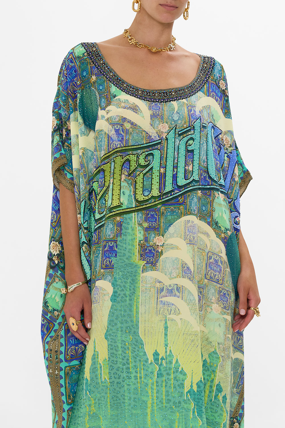 The CAMILLA JERSEY SCOOP NECK TANK TOP SONG OF SAINT ANTHONY in our  print.