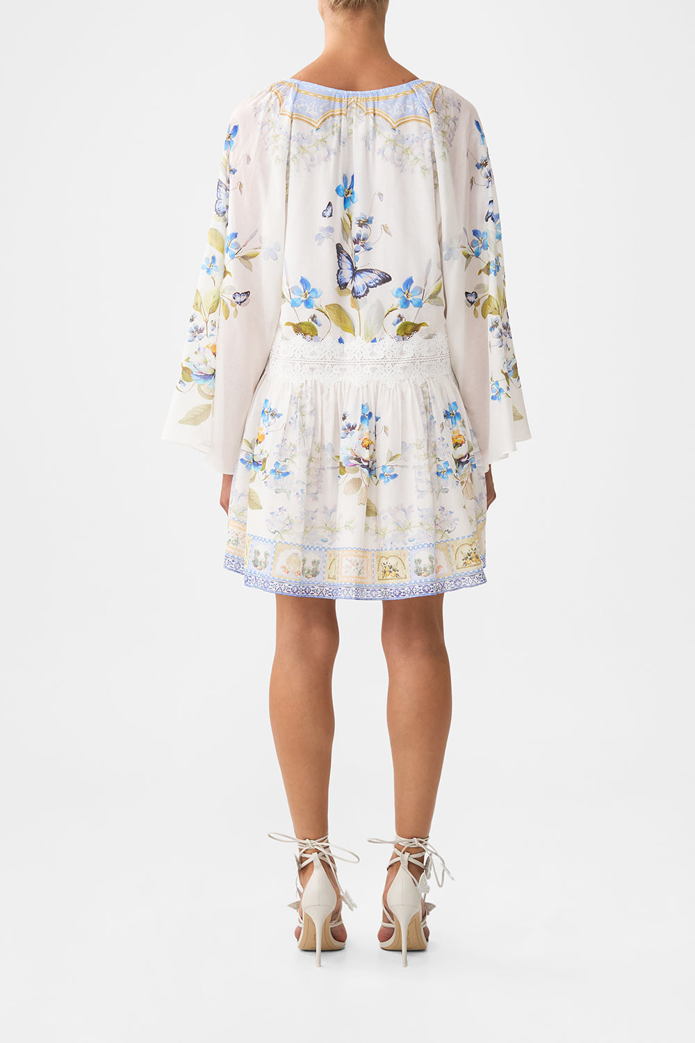 The CAMILLA SHORT SLEEVE SILK SHIRT WITH KNIT SLEEVE MY LUCKY STARS in our MY LUCKY STARS print.