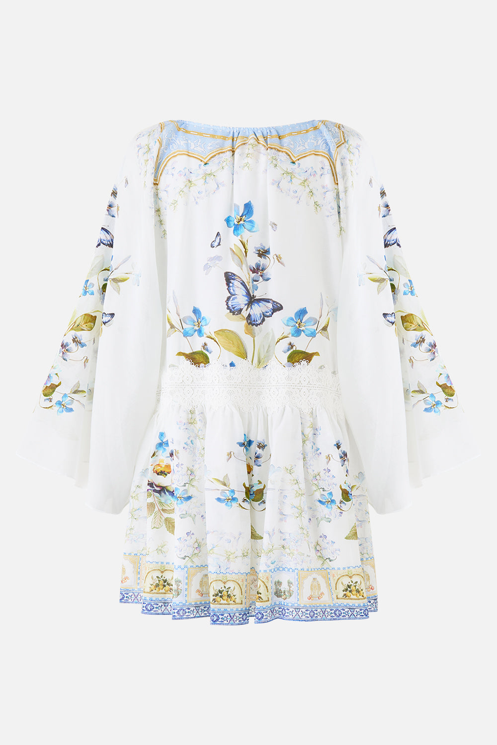 The CAMILLA SHORT SLEEVE SILK SHIRT WITH KNIT SLEEVE MY LUCKY STARS in our  print.