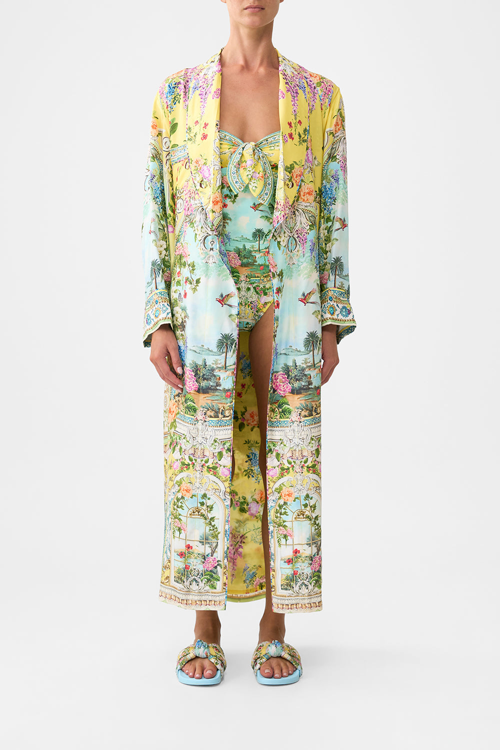 The CAMILLA OFF SHOULDER ELASTIC TOP FOOTSTEPS IN FOLKLORE in our  print.