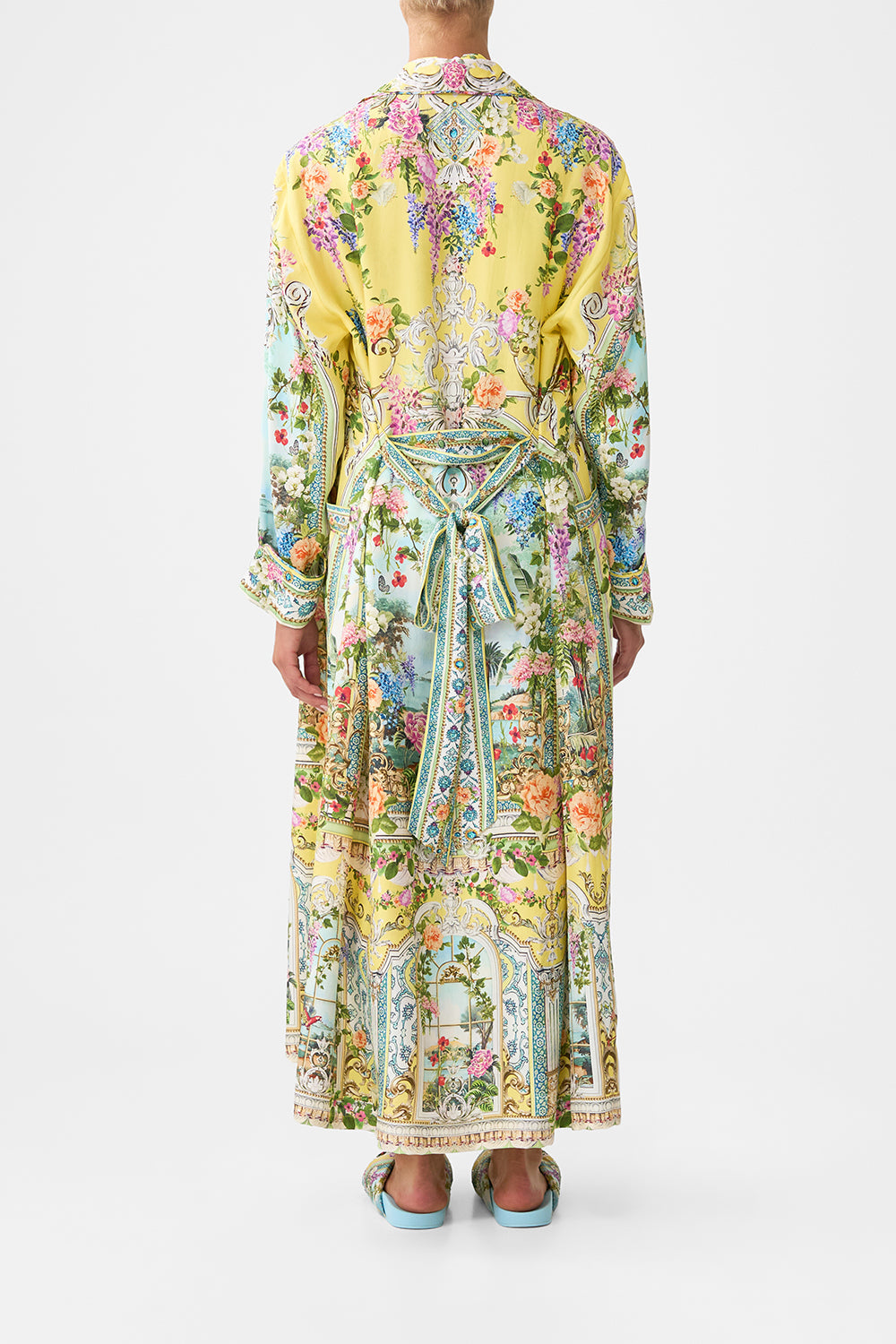 The CAMILLA OFF SHOULDER ELASTIC TOP FOOTSTEPS IN FOLKLORE in our  print.