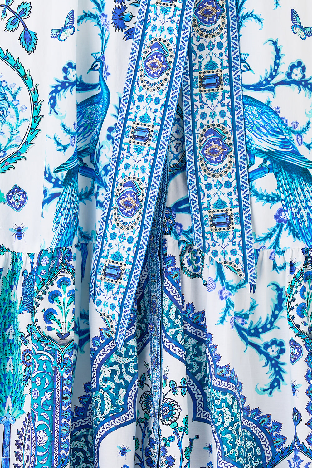 The CAMILLA BUTTON FRONT HALTER PLAYSUIT NOTES FROM THE ROAD in our NOTES FROM THE ROAD print.