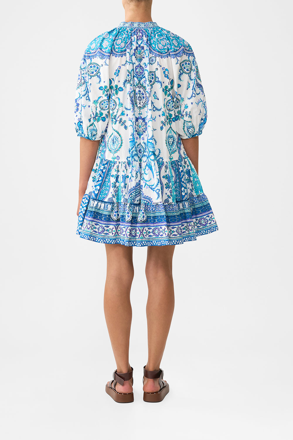 The CAMILLA PANELLED SIDE SPLIT TEE NOTES FROM THE ROAD in our  print.