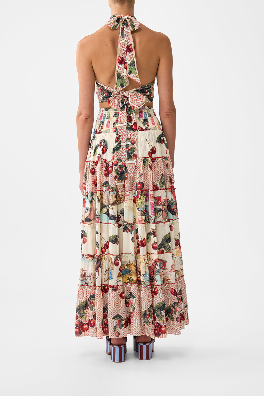 The CAMILLA TIE NECK HALTER JUMPSUIT A CERAMIC GARDEN in our  print.