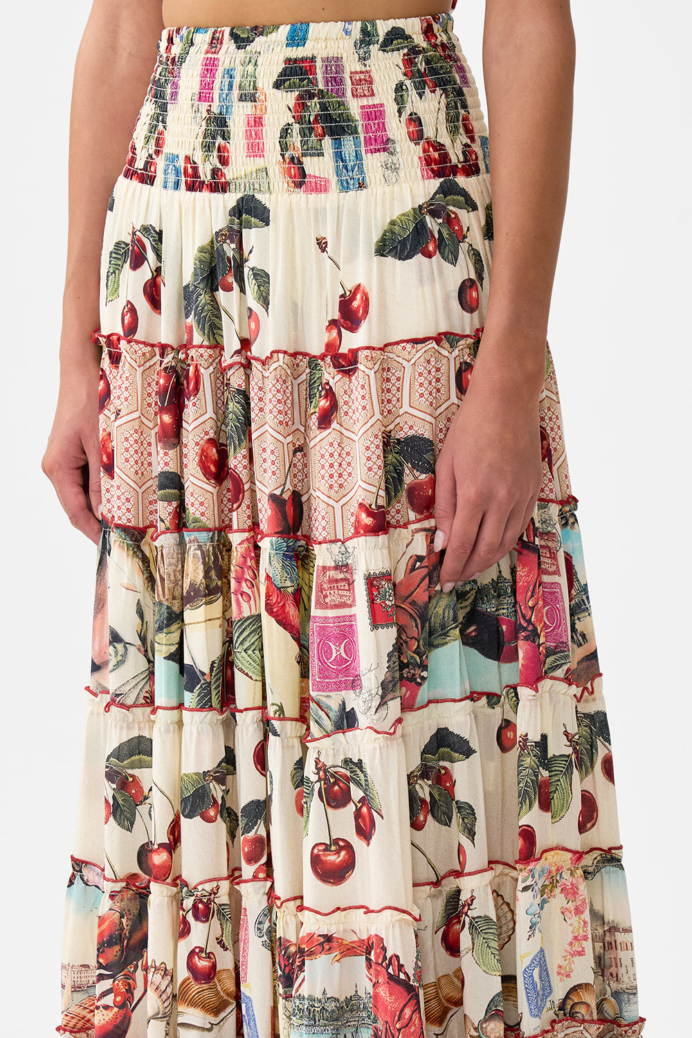 The CAMILLA TIE NECK HALTER JUMPSUIT A CERAMIC GARDEN in our  print.