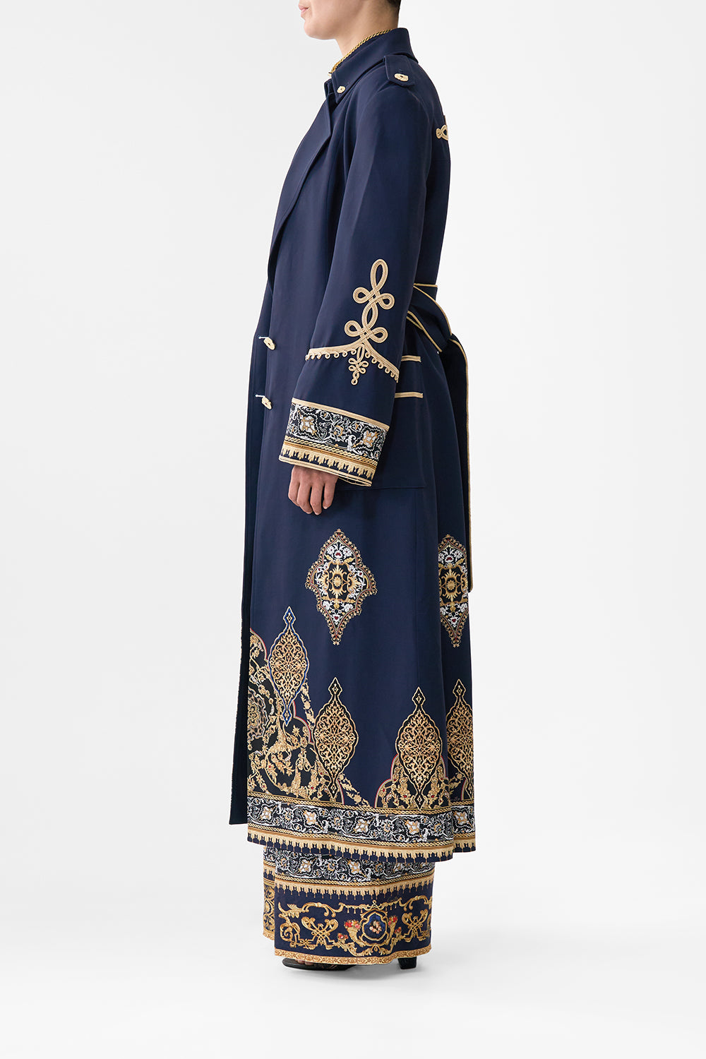 The CAMILLA PLUNGE BACKLESS HALTER ONE PIECE WITH RING TIES CONCUBINES, SULTANS & COURTIERS in our  print.