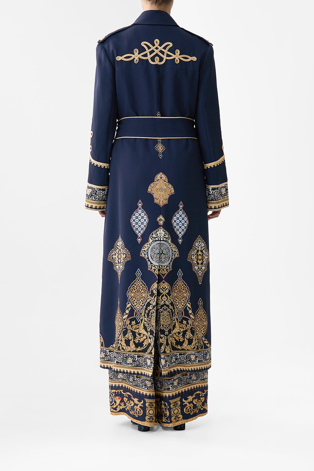 The CAMILLA PLUNGE BACKLESS HALTER ONE PIECE WITH RING TIES CONCUBINES, SULTANS & COURTIERS in our  print.