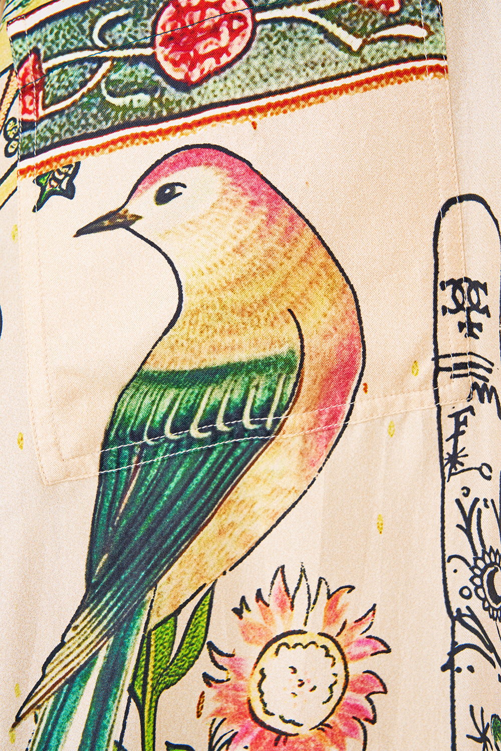 OVERSIZED POCKET TUNIC HOUSE OF HOROSCOPES