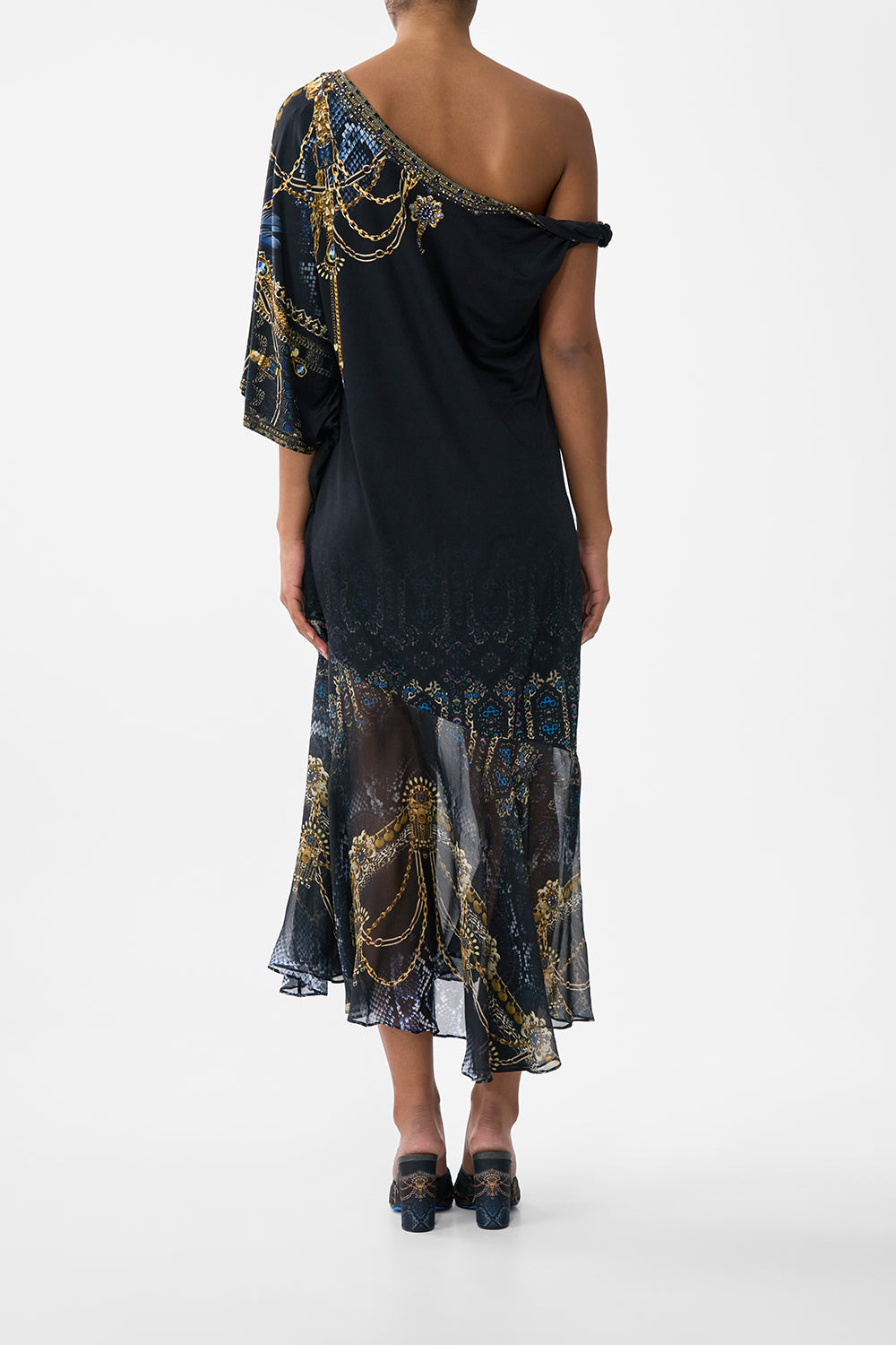 The CAMILLA PIERCED V NECK KAFTAN COSMIC ZOOLOGY in our  print.