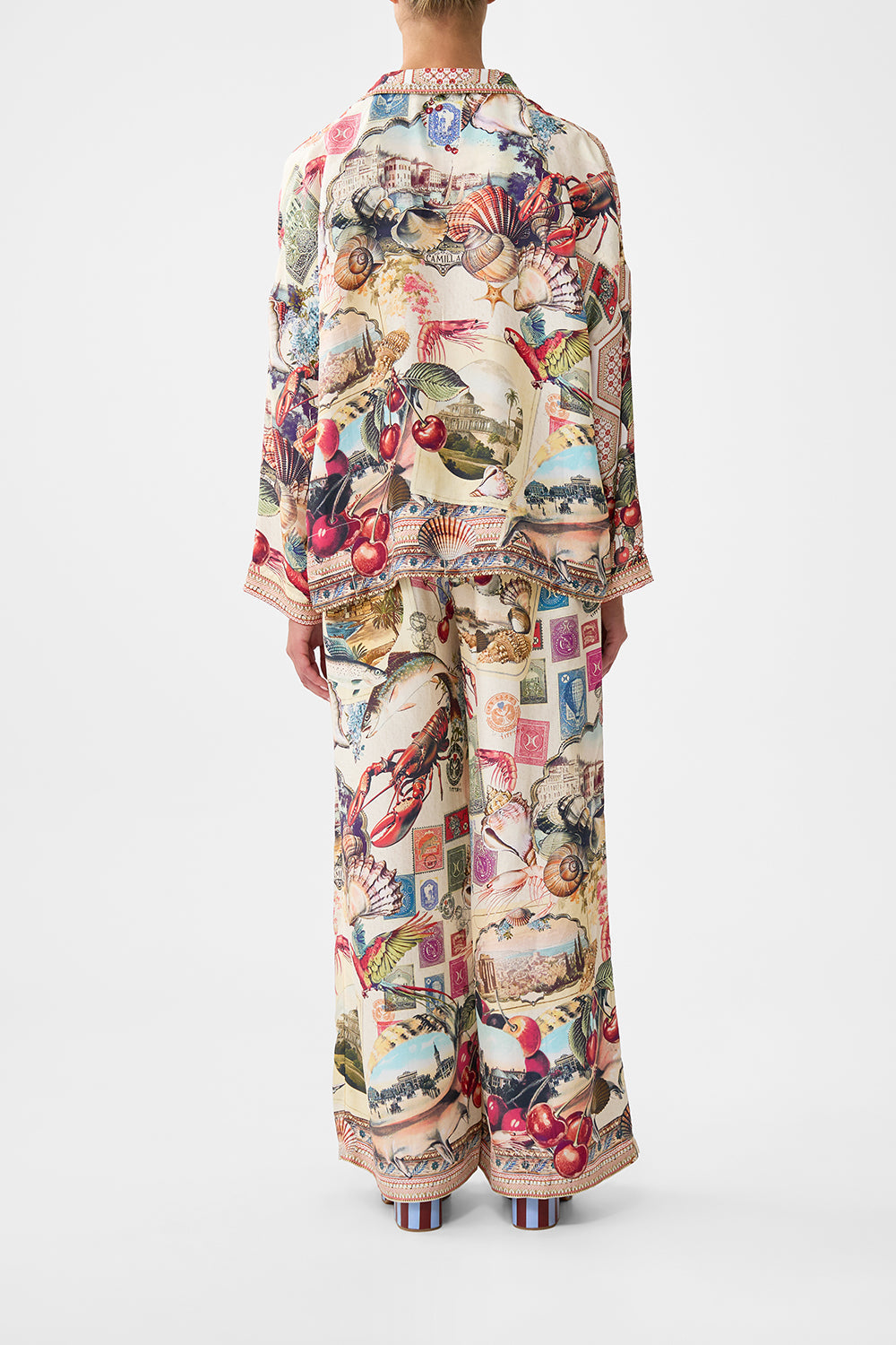 The CAMILLA TWIST FRONT WAISTED DRESS TOTEMS AND TREASURES in our  print.