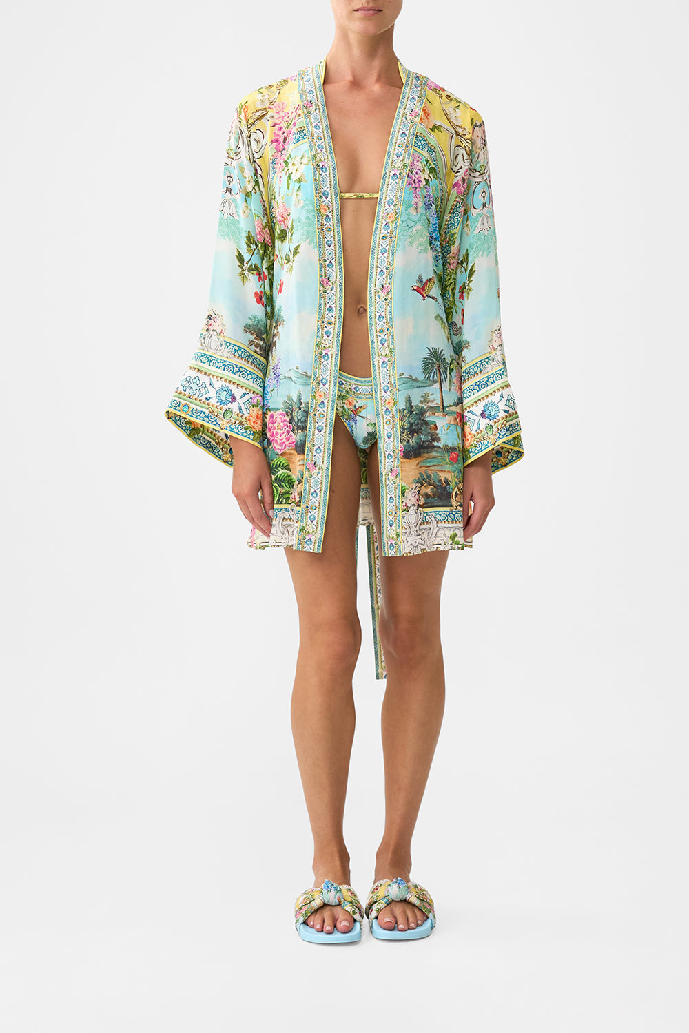 The CAMILLA BUTTON FRONT FRILL DRESS A CERAMIC GARDEN in our  print.