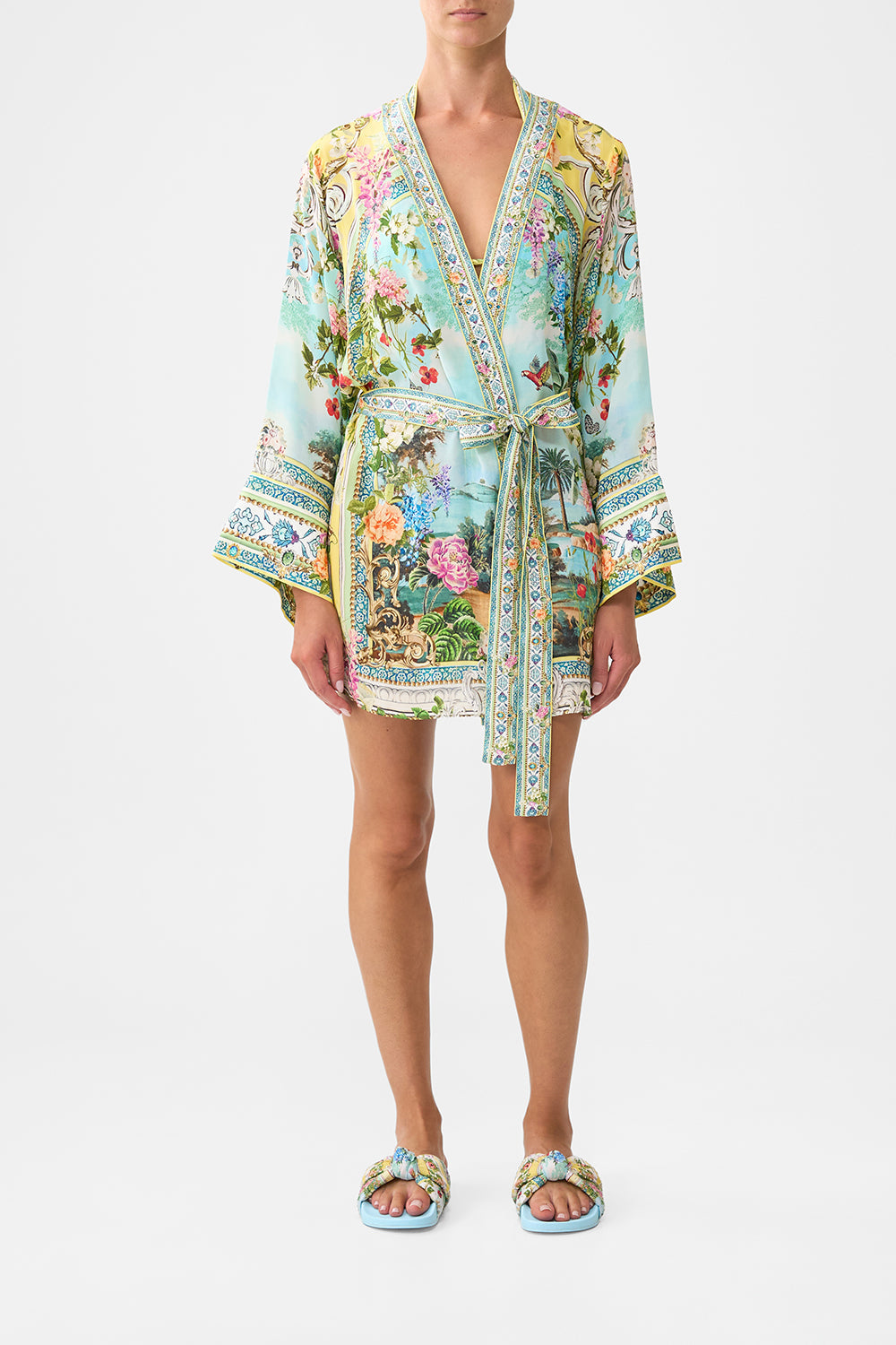The CAMILLA BUTTON FRONT FRILL DRESS A CERAMIC GARDEN in our  print.