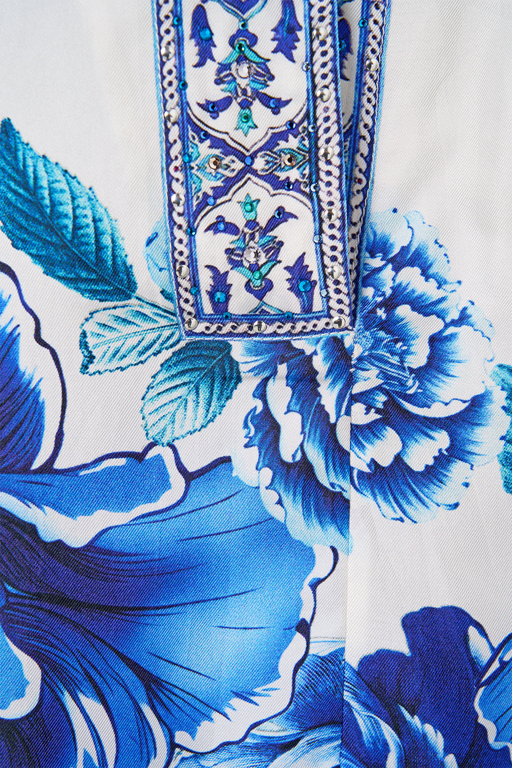 The CAMILLA DRAWSTRING POUCH BAG WITH CHAIN STRAP TILED IN TIME in our  print.